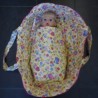 reiswieg geel beer met hard roze voor poppen van 40t/m 48cm